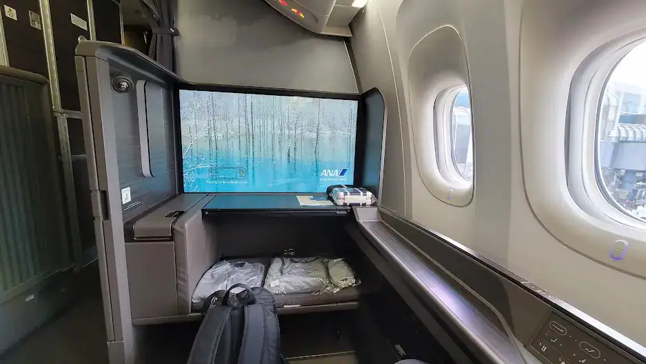 Luxurious first class cabin on ANA flight to Japan, great for long-haul travel.
